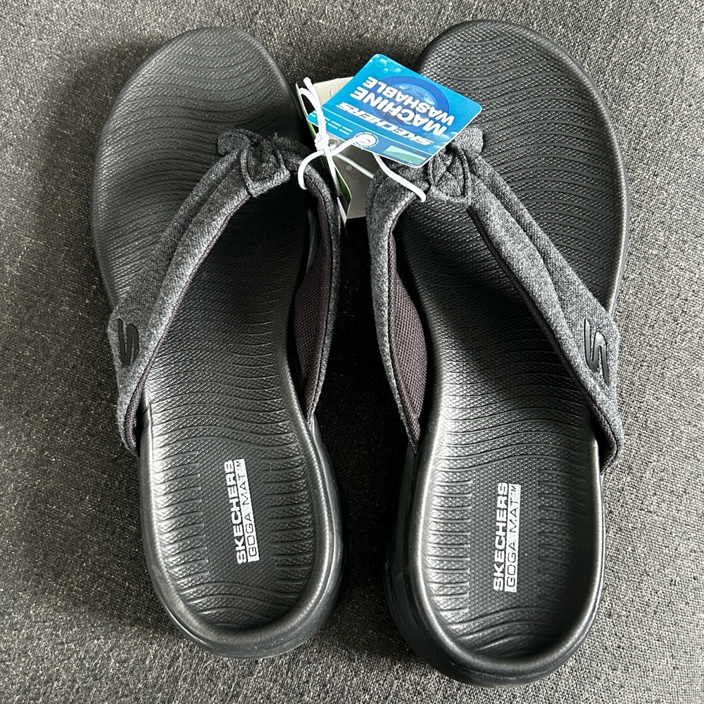 Size 7 Black sketcher flip flops